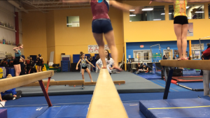 Flat foot and faulty lower leg train seen with switch leap landing on beam